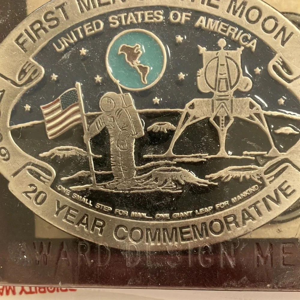 Nib first on moon belt buckle
